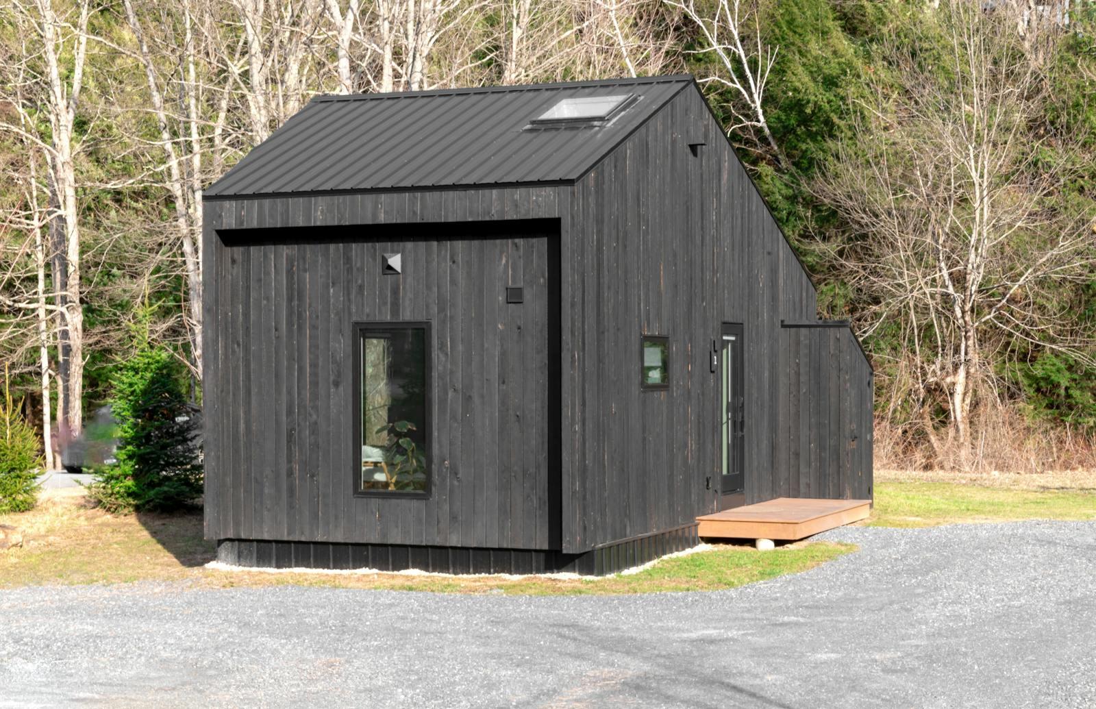 Modern backyard ADU with large compliant dual-pane windows in a Sierra Foothills setting